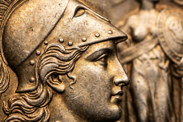 Extreme macro close-up of a Standing Liberty Quarter, focusing on the profile of Liberty wearing a Phrygian-style helmet with golden-brown toning.